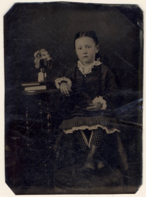 http://SPCRPhotoCollection.wyo.gov:80/MediaManager/srvr?mediafile=/Size2/SPCRACV~3~3/1815/P72-25_9%2C_child_sitting_beside_a_table%2C_tintype.jpg